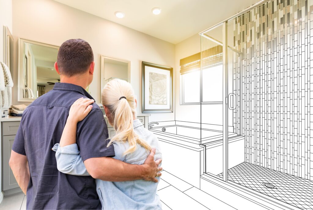 couple embracing in front of bathroom remodel